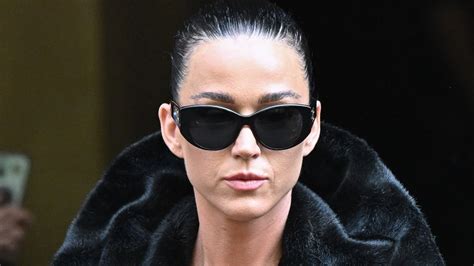 black furries|Katy Perry goes topless in black fur coat at Paris Fashion Week.